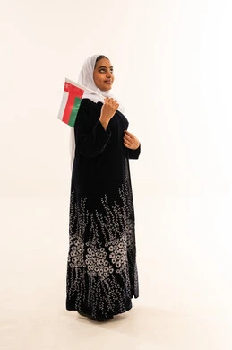 Omani Woman with National Flag in Studio