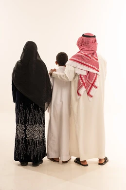 Saudi Family in Traditional Clothing Back View White Background
