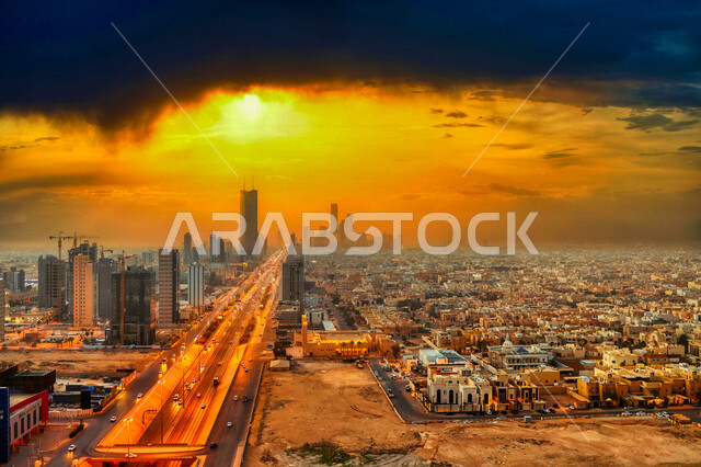 صورة ابداعية لشروق وغروب الشمس في مدينة الرياض بالمملكة العربية السعودية، شروق وغروب الشمس، الفن الهندسي المعماري في السعودية، الابراج وناطحات السحاب، معالم الرياض المشهورة، السياحة في السعودية