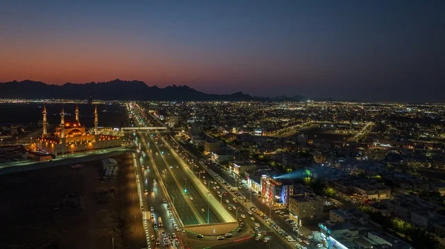 Aerial night view of the mosque and the highway in the city of Hail.