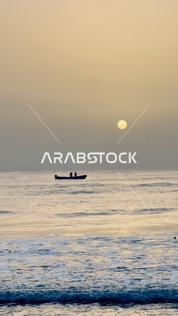 Fishing Boat in Oman at Sunset on Calm Ocean