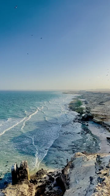 Oman Rocky Coastline and Blue Ocean Waves