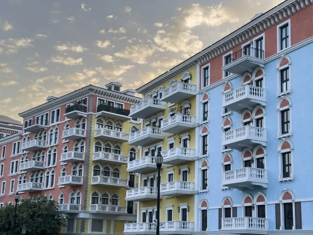 Qanat Quartier canal at The Pearl in Doha showcasing luxury buildings and beautiful reflections on the water. doha.Qatar - February 15 2026 .