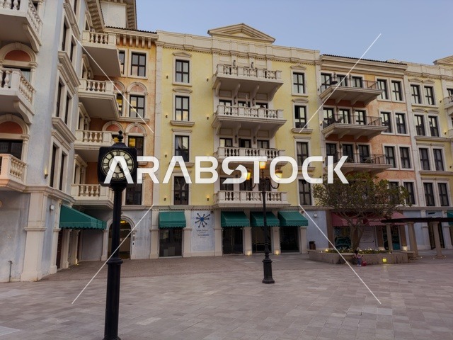 Qanat Quartier canal at The Pearl in Doha showcasing luxury buildings and beautiful reflections on the water. doha.Qatar - February 15 2026 .
