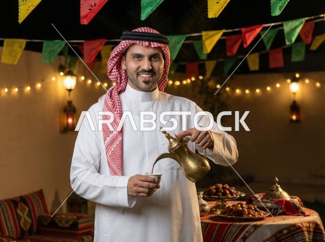 Saudi Man Pouring Arabic Coffee During Eid Celebration