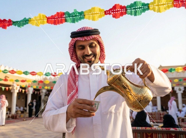 Saudi Man Pouring Arabic Coffee during Eid Celebration