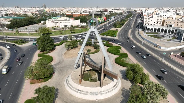 Engineering Roundabout in Jeddah, paved roads and streets in the city, green natural landscapes in the Kingdom of Saudi Arabia.