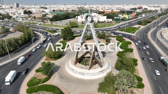 Engineering Roundabout in Jeddah, paved roads and streets in the city, green natural landscapes in the Kingdom of Saudi Arabia.