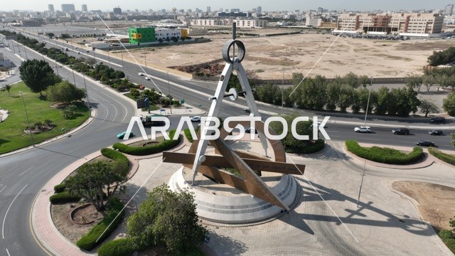 Engineering Roundabout in Jeddah, paved roads and streets in the city, green natural landscapes in the Kingdom of Saudi Arabia.