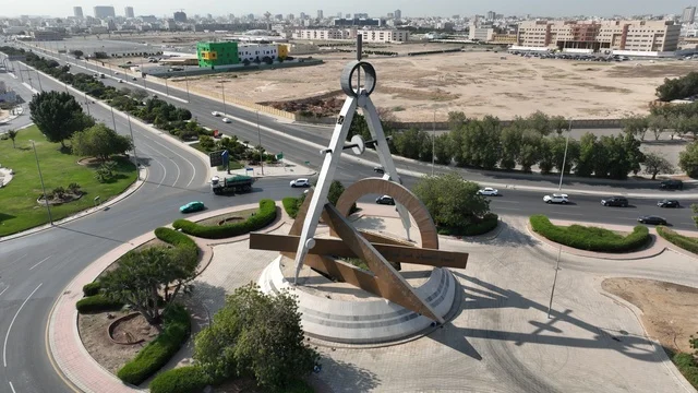 Engineering Roundabout in Jeddah, paved roads and streets in the city, green natural landscapes in the Kingdom of Saudi Arabia.
