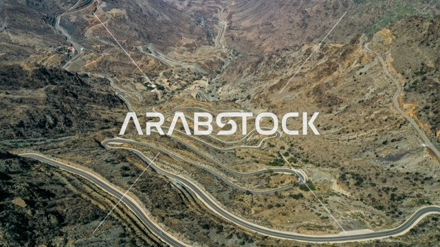 التضاريس الجبليه في الهدا جنوب السعوديه, الطرق المعبده المتعرجه في مدينة ابها, طبيعة الجبال الصخريه الوعره, خلفية الطبيعه