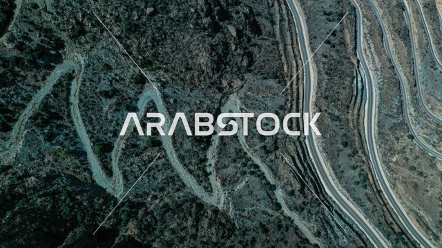 التضاريس الجبليه في الهدا جنوب السعوديه, الطرق المعبده المتعرجه في مدينة ابها, طبيعة الجبال الصخريه الوعره, خلفية الطبيعه