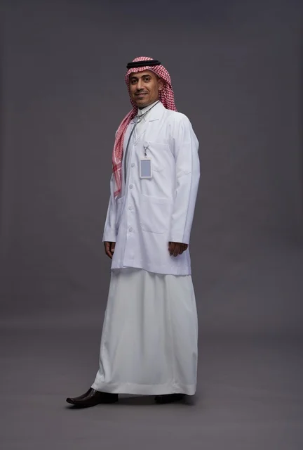 A Saudi Arabian Gulf Arab doctor wearing a thobe and a white coat with a stethoscope is making various gestures and signals, full body, gray background.