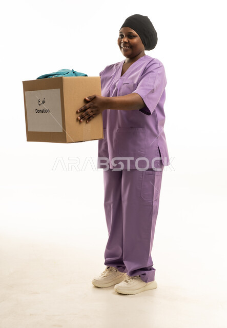Saudi Female Nurse Holding Charity Donation Box