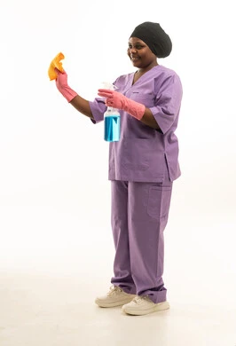African Woman Cleaner in Uniform Studio Shot