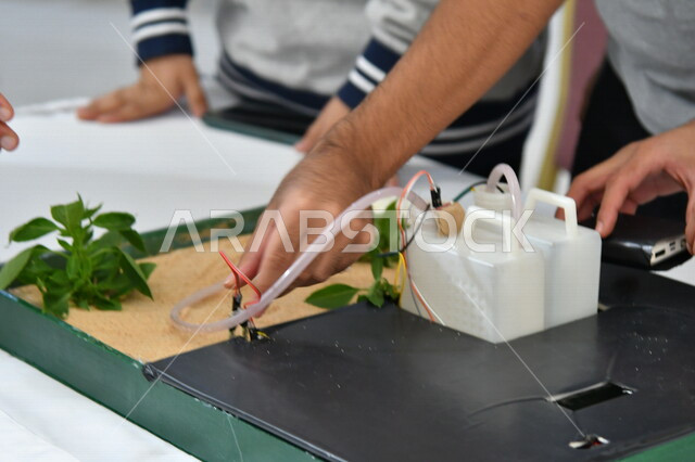 صورة مقربة لمجموعة مختصين في الدراسات الزراعية ، مختبر علمي زراعي ، بحوث زراعية ، الزراعة والري