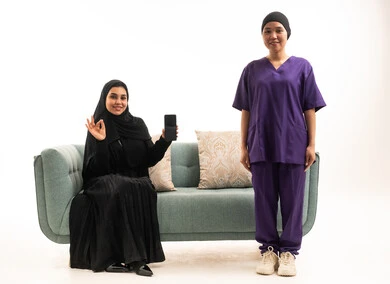 Arab Woman and Asian Nurse with Smartphone