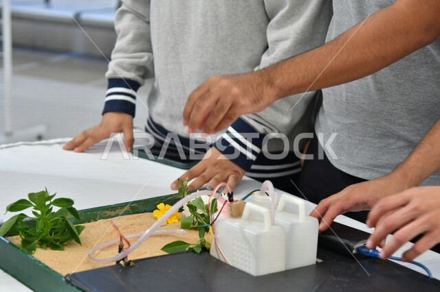 صورة مقربة لمجموعة مختصين في الدراسات الزراعية ، مختبر علمي زراعي ، بحوث زراعية ، الزراعة والري