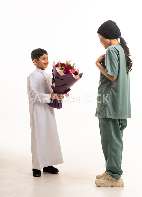 Saudi Boy Giving Flowers to Domestic Worker on White
