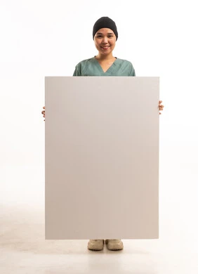 Asian Female Nurse Holding Blank White Placard