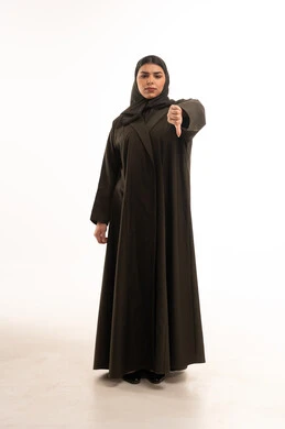 Saudi Woman in Black Abaya Giving Thumbs Down