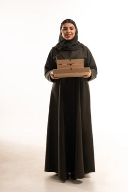 Saudi Woman Holding Pizza Boxes on White Background