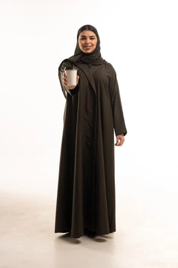 Arab Woman in Abaya Holding Coffee Cup Studio