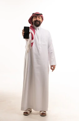 Saudi Man Holding Smartphone on White Background