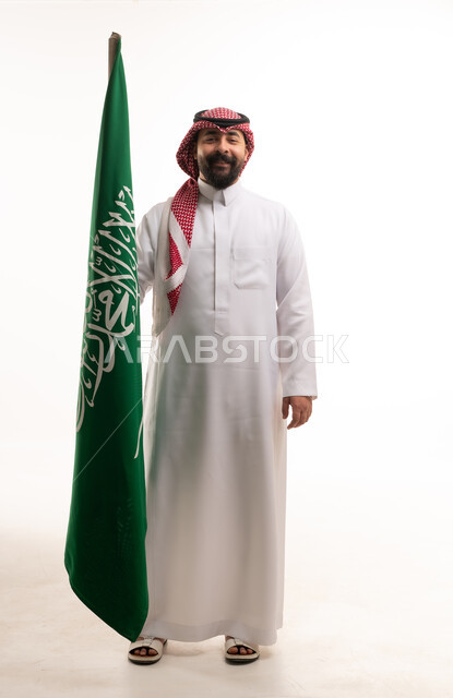 Saudi Man Holding National Flag on White Background