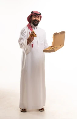 Saudi Man in Traditional Dress Holding Pizza Box