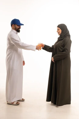 Saudi Delivery Man Handing Drink to Woman in Abaya