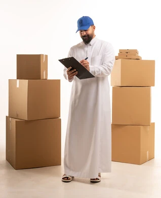 Saudi Man in Thobe Managing Delivery Boxes