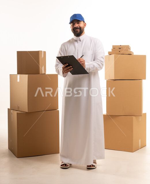 Saudi Delivery Man with Boxes on White Background