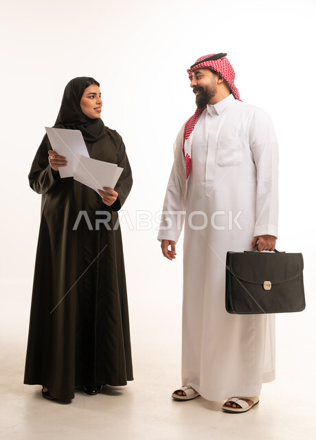 Saudi Business Colleagues in Traditional Attire Studio