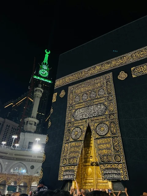 Holy Kaaba and Makkah Clock Tower at Night