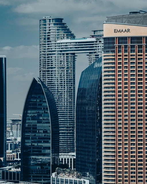Modern Emaar Towers and City Skyscrapers Skyline