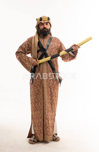 Saudi Man in Traditional Ardah Costume with Sword