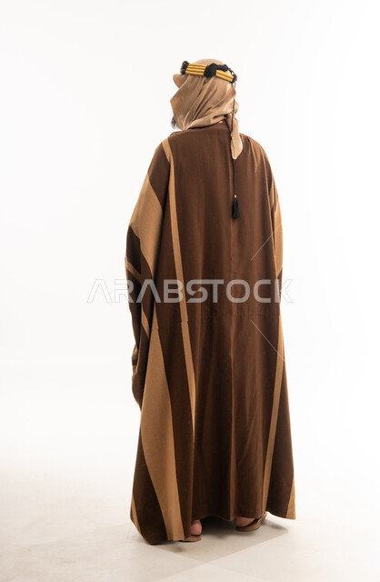 Saudi Man in Traditional Brown Winter Bisht Back View