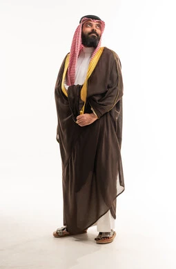Saudi Man in Traditional Bisht and Thobe Studio Shot