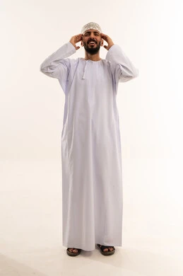 Omani Man in Traditional Dress with Headache