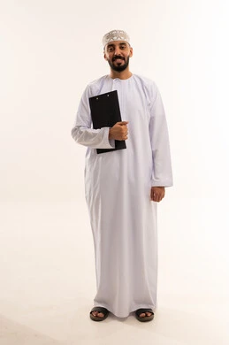 Omani Man in Traditional Dress Holding Clipboard