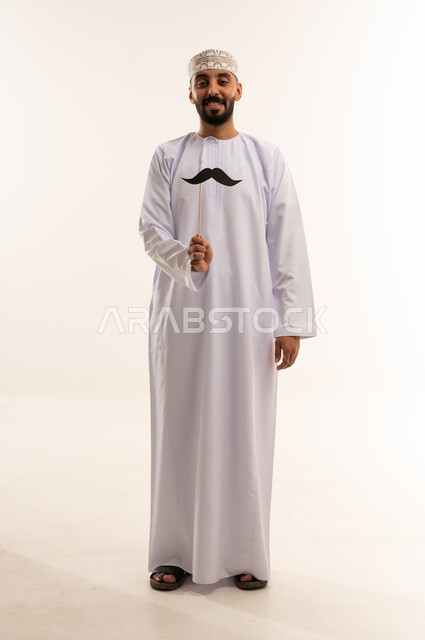 Omani Man in Traditional Dishdasha with Mustache Prop