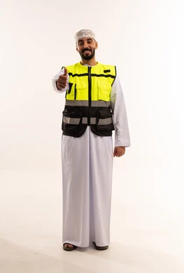 Omani Man in Safety Vest Giving Thumbs Up on White