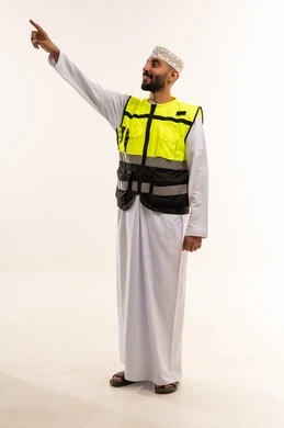 Omani Man in Safety Vest Pointing Upward