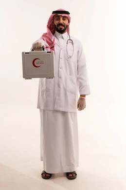 Saudi Male Doctor Holding First Aid Kit on White Background