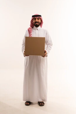 Saudi Man in Traditional Dress Holding Delivery Box
