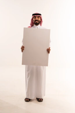 Saudi Man Holding Blank White Board in Studio