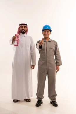 Saudi Businessman and Construction Worker Thumbs Up