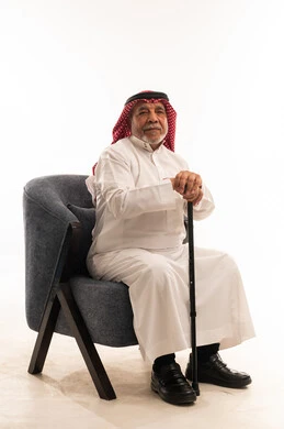 Elderly Saudi Man with Cane in Studio