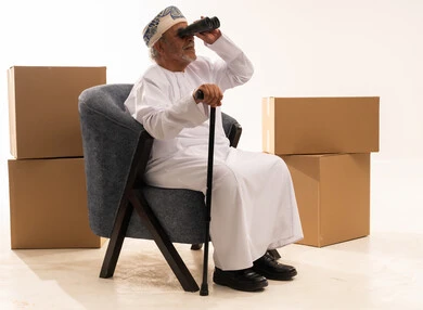 Omani Elderly Man with Binoculars in Studio